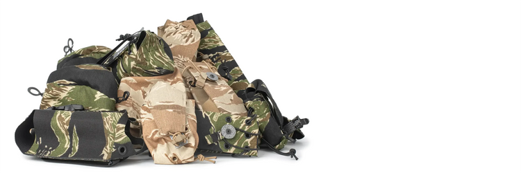 Agility Systems gear: Vietnam and Desert Tiger Stripe camo patterns on modular tactical pouches and accessories.